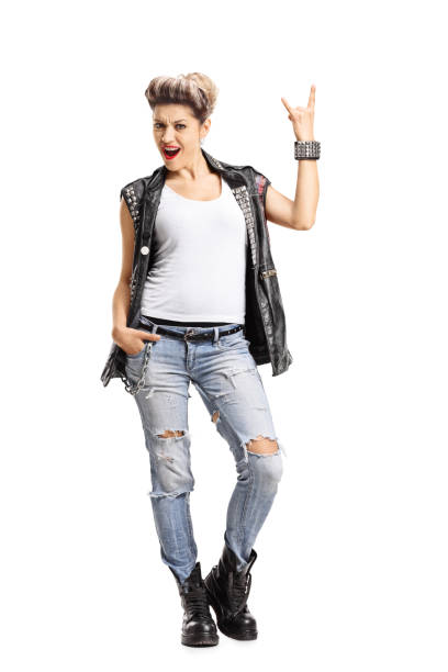 istock Punk girl making a rock hand gesture 685874158