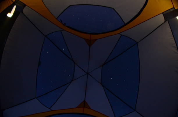 istock Wideangle vertical view of stars though tent screen 685876468