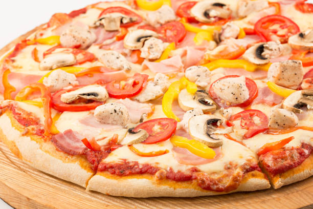 istock Meat Pizza, mozzarella, ham, bacon, chicken, peppers, tomatoes, mushrooms 685877326