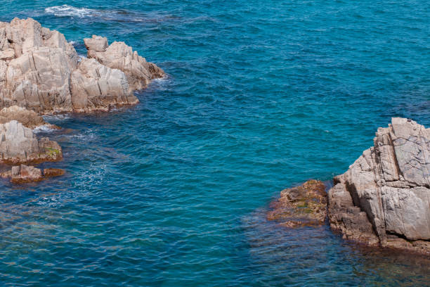istock The Summer Blue sea with the rock 685880436