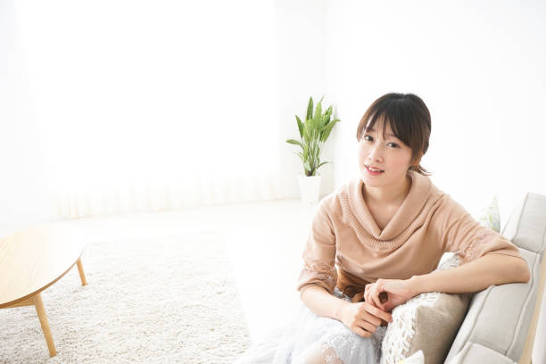 istock Young woman relaxing at home 685881320