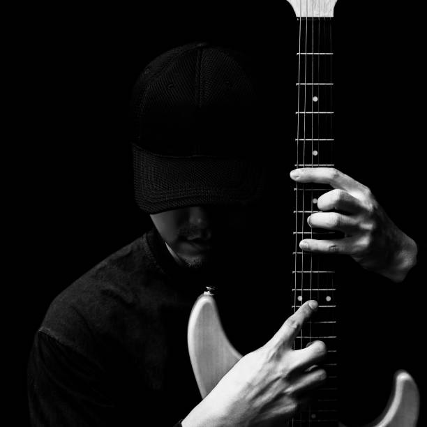 istock asian handsome musician posing on electric guitar 685884534