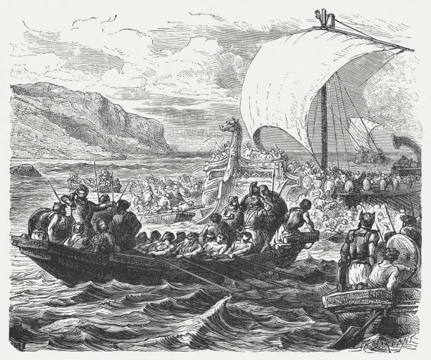 Landing of Phoenician ships on a coast, published in 1880 Landing of Phoenician ships at the Mediterranean coast. Wood engraving after a drawing by Paul Philippoteaux (French painter, 1846 - 1923), published in 1880. phoenicia stock illustrations