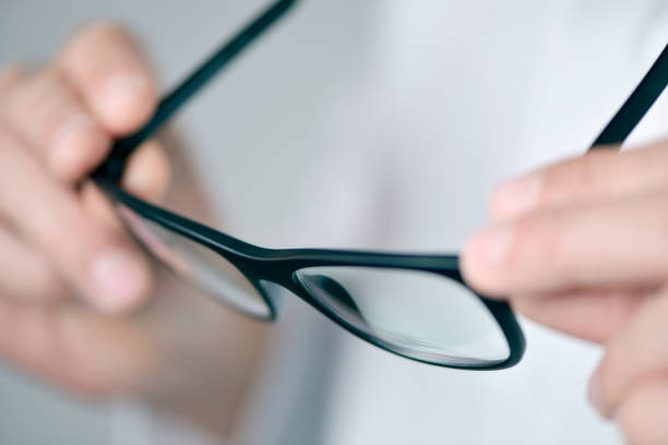 istock optician man checking a pair of eyeglasses 685884702