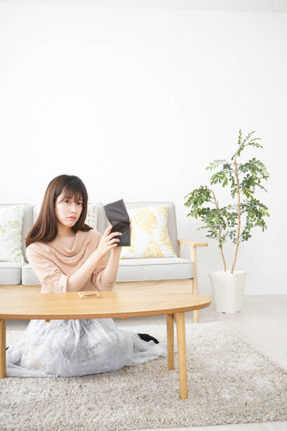 istock Young woman figuring domestic accounts 685884968