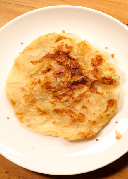 istock Roti canai is a popular Malaysian dish. 685885390