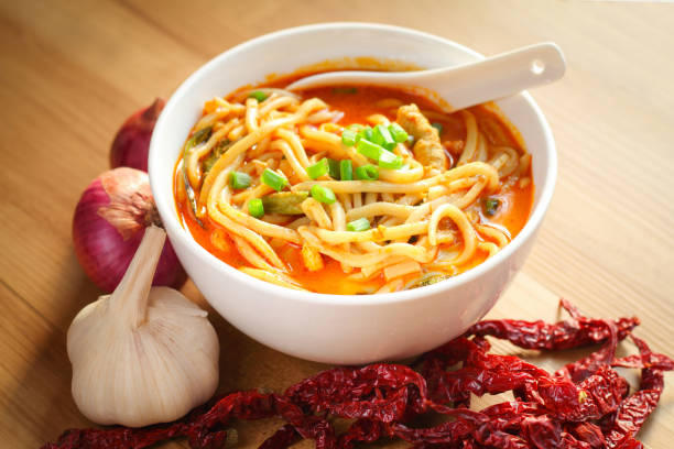 istock Hot and spicy curry noodle on the table 685885630