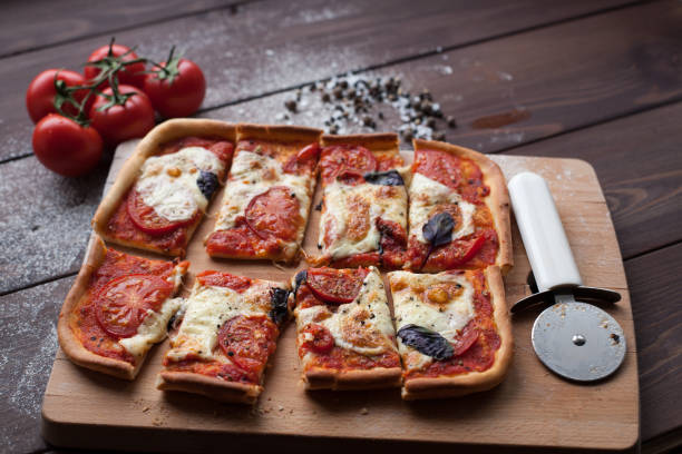istock rustic italian pizza with mozzarella, cheese and basil leaves 685890728