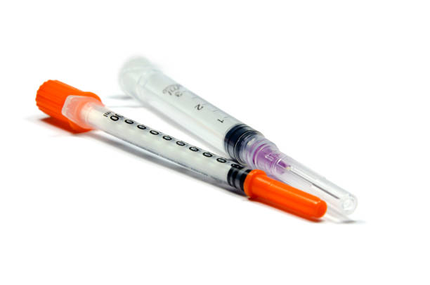 istock Medical syringe on white background 685891050