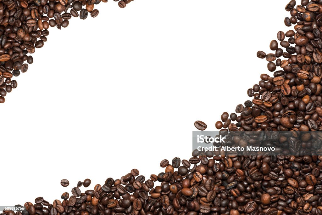 Coffee Beans Isolated on White Background Group of roasted coffee beans isolated on white background with copy space. Two corners Roasted Coffee Bean Stock Photo