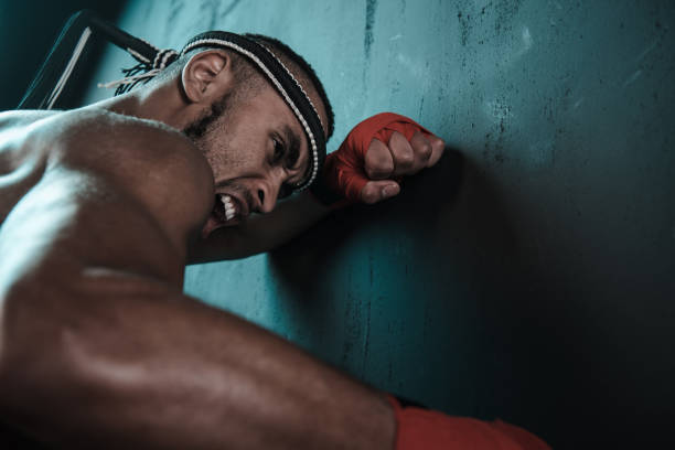 istock Muay Thai athlete training at Thai boxing indoors, ultimate fight concept 685907366