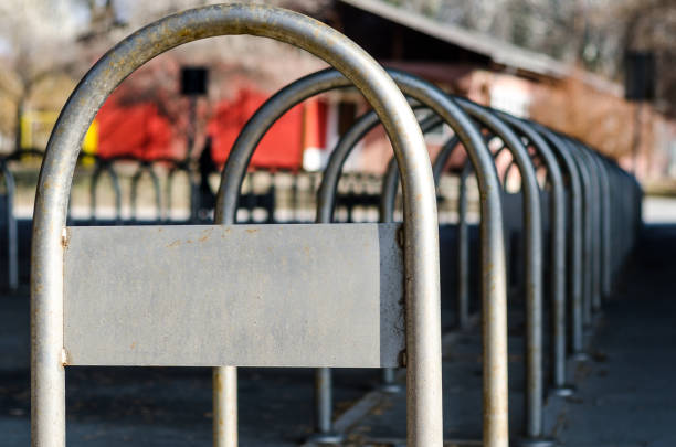 Bicycle parking lot. Empty parking lot for bicycles under the bridge. Selective focus.