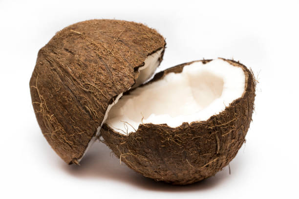 istock Coconut with a half on white background, closeup 685915368