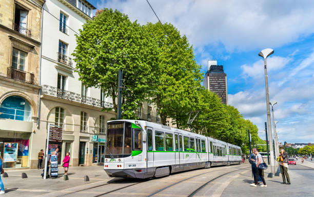 Modern tram in the centre of Nantes - France Nantes, France - April 14, 2017: Modern tram in the centre of Nantes nantes photos stock pictures, royalty-free photos & images