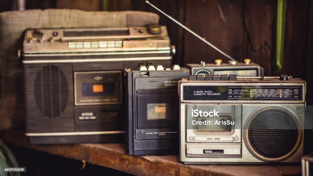 Vintage Photo Antique Portable Radio. Adjusting Stock Photo