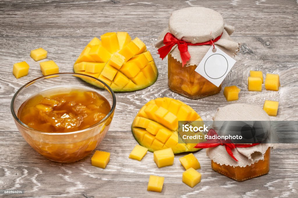 mango, mango slices, mango jam mango, mango slices, mango jam on a light wooden background Bread Stock Photo