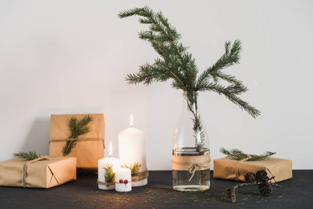 istock Christmas decorations on tha table with presents, candles and spruce 685967496