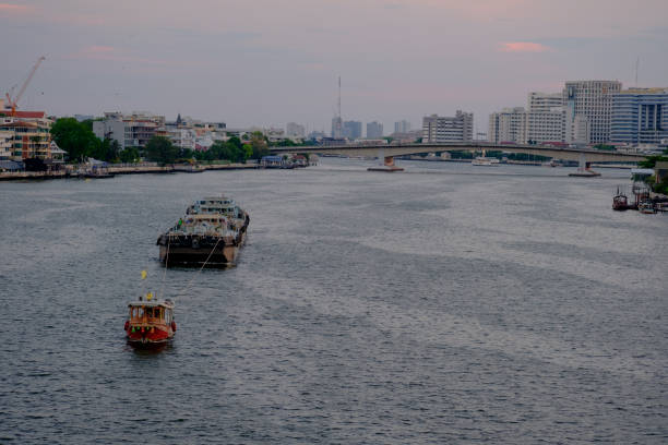 istock Thai boat tugboat is dragging on Chao Phraya River. 685967796