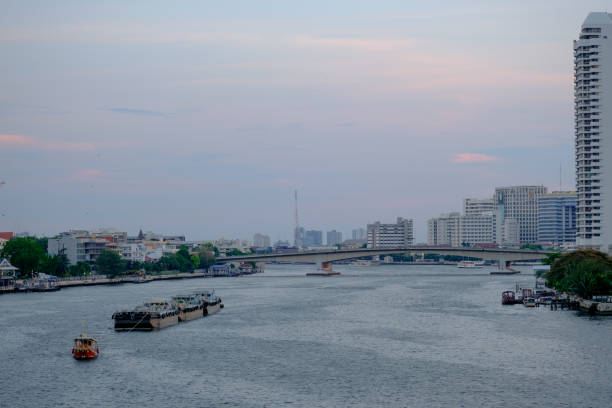 istock Thai boat tugboat is dragging on Chao Phraya River. 685967878