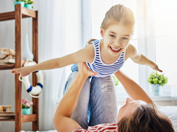 istock father and daughter play 685991030
