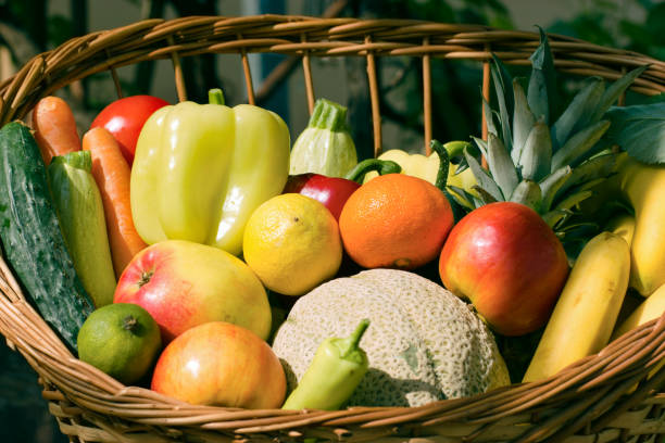 istock Fresh organic fruit and vegetable in wicker basket 685991082