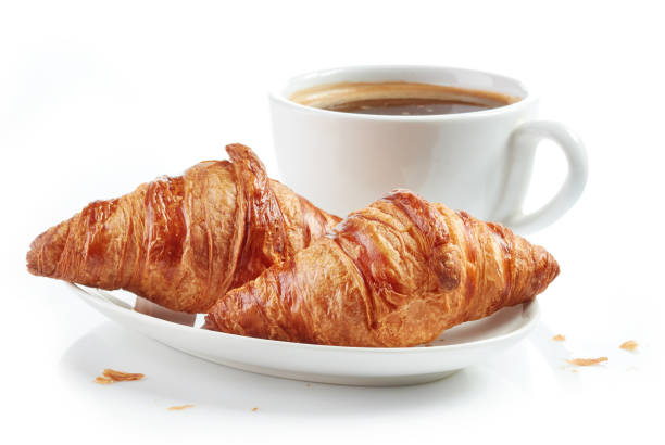 istock fresh croissants and coffee cup 685991358