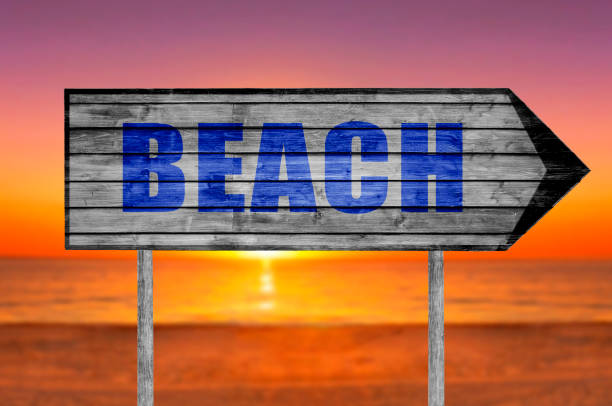 Beach wooden sign with a beach