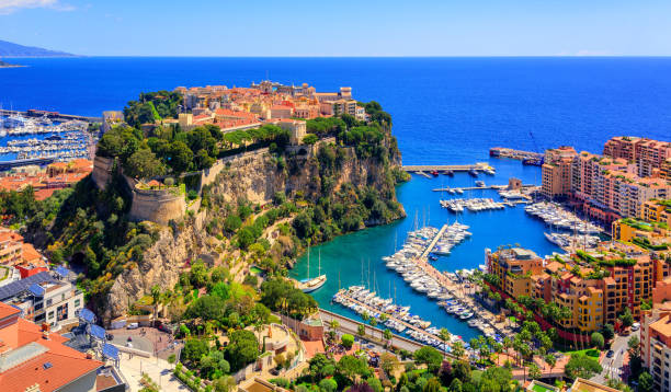 Prince Palace and old town of Monaco, France Old town and Prince Palace on the rock in Mediterranean Sea, Monaco, southern France french riviera photos stock pictures, royalty-free photos & images