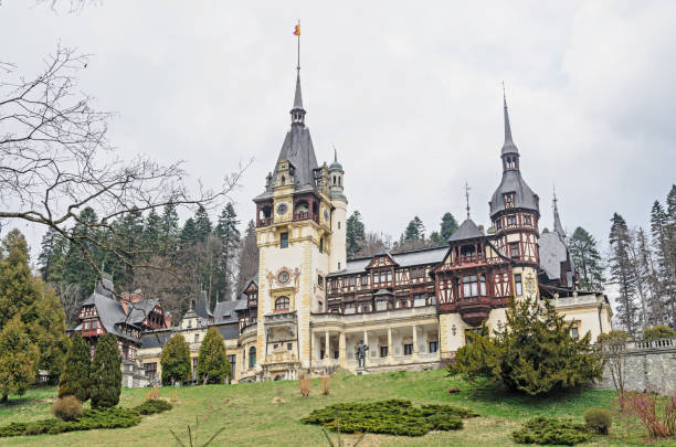 sinaia, romania - april 4, 2017: visiting the peles castle from sinaia romania, carpathian mountains - mansion tudor style non urban scene residential structure imagens e fotografias de stock