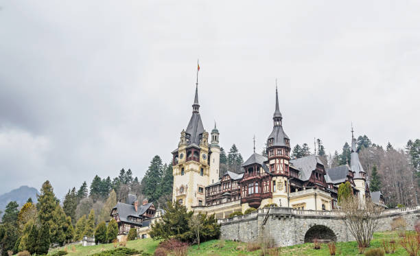 sinaia, romania - april 4, 2017: visiting the peles castle from sinaia romania, carpathian mountains - mansion tudor style non urban scene residential structure imagens e fotografias de stock