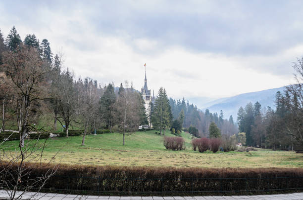 sinaia, romania - april 4, 2017: visiting the courtyard of the peles castle from sinaia romania, carpathian mountains - mansion tudor style non urban scene residential structure imagens e fotografias de stock