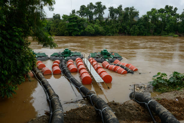 floating barge pumps, paraíba river, brazil - water cannon imagens e fotografias de stock