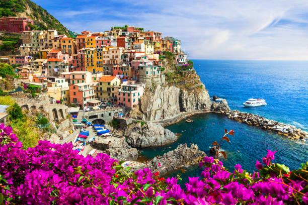 Colors of Italy series -Manarola village , Cinque terre Beautiful Ligurian villages " cinque terre" - popular touristic attraction fishing boat photos stock pictures, royalty-free photos & images