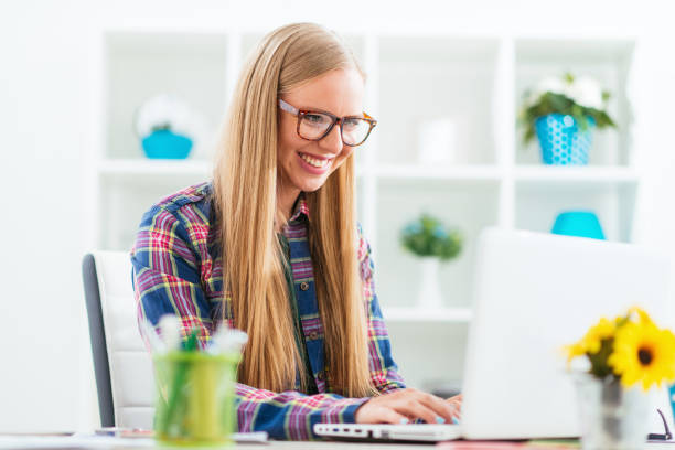 istock Cheerful businesswoman working in office 686048742