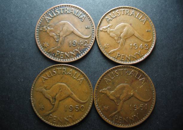 istock Four Vintage Australian One Penny Coins. Reverse side with Kangaroo. 686077752