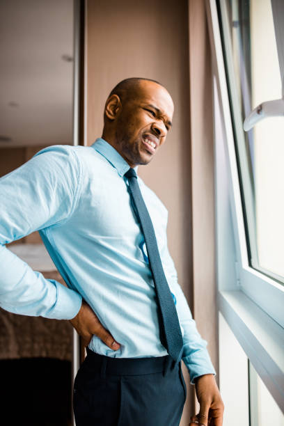 istock businessman waking up in the bedroom 686086792