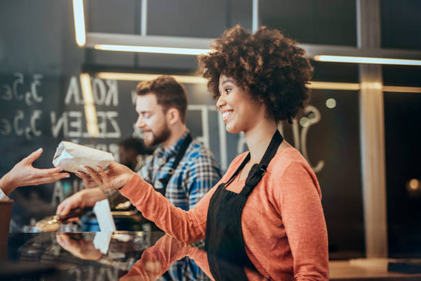 istock Serving Customers in Fast Food Restaurant 686106898