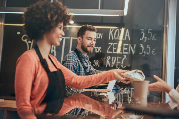 istock Serving Customers in Fast Food Restaurant 686107138