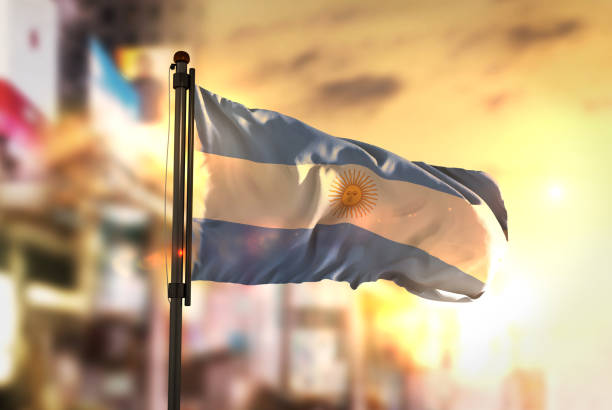 istock Argentina Flag Against City Blurred Background At Sunrise Backlight 686124332