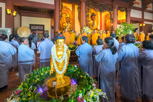 Ho Chi Minh City, Vietnam - May 10th, 2017: Buddhist revered ceremony in temple beautiful architecture, many statues sanctuary express cultural beauty of religious spirituality in Ho Chi Minh, Vietnam