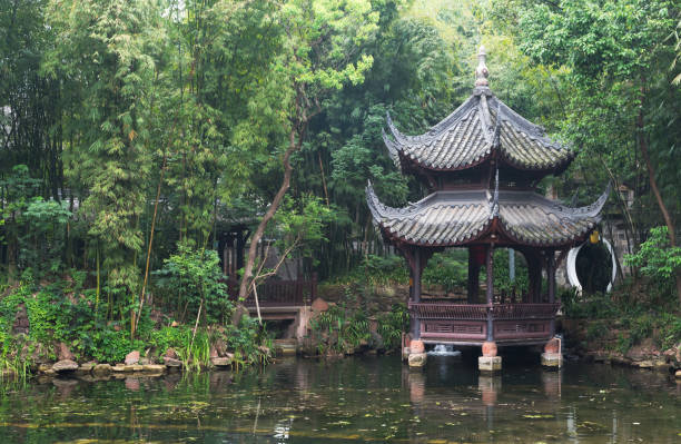 istock Chinese pavilion by a pond in a park 686127692