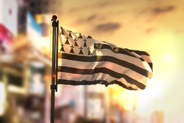 istock Brittany Flag Against City Blurred Background At Sunrise Backlight 686136632