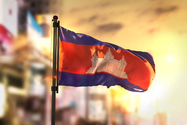 istock Cambodia Flag Against City Blurred Background At Sunrise Backlight 686136706