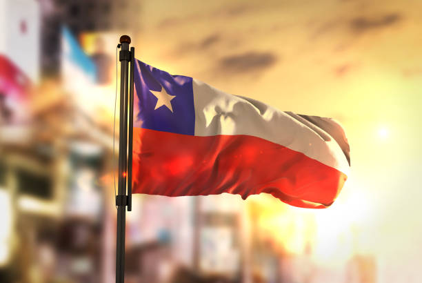 istock Chile Flag Against City Blurred Background At Sunrise Backlight 686136848