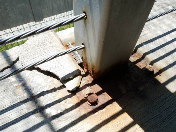 istock rusted nuts and broken cement in parking garage 686136902