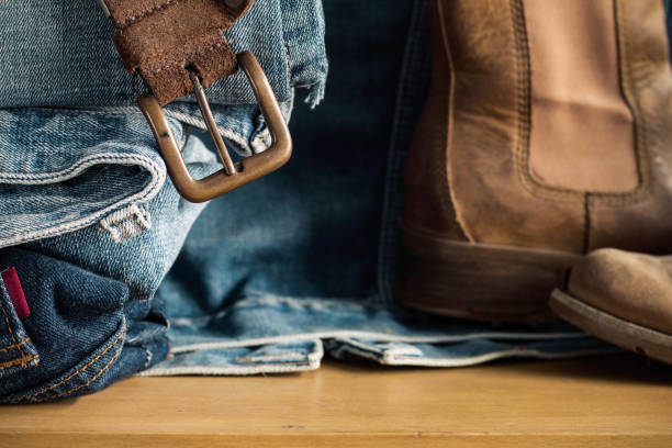 istock belt and Jeans on wooden. 686140130