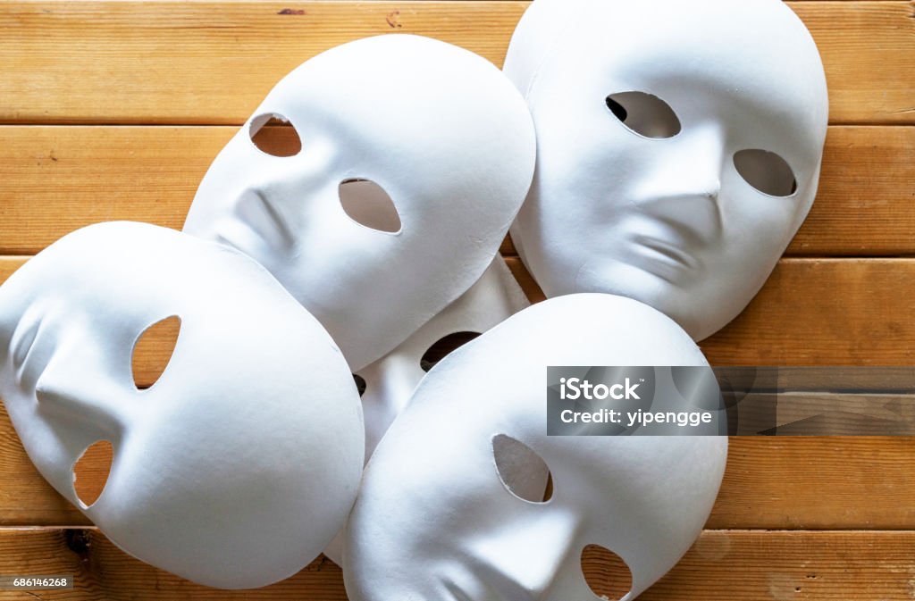 Paper Masks On Table Stock Photo - Download Image Now - Acting