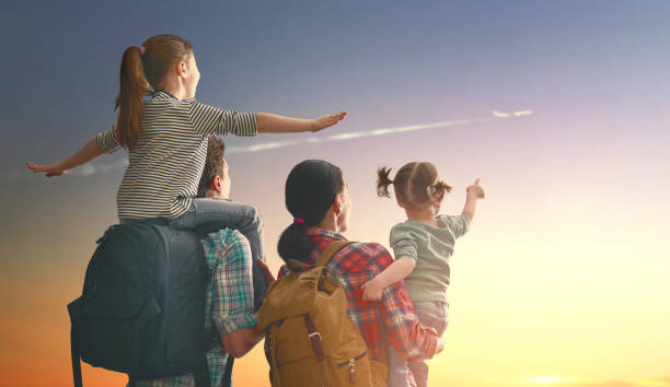 istock family at sunset 686152386