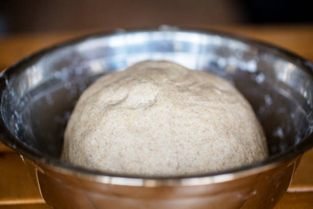 istock flour dough in iron bowl 686153578