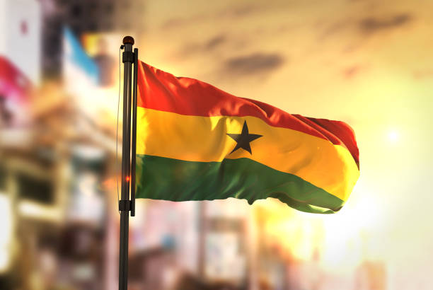 istock Ghana Flag Against City Blurred Background At Sunrise Backlight 686155790
